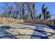 A spacious fenced-in backyard features a cozy fire pit area for outdoor gatherings at 543 Paines Nw Ave, Atlanta, GA 30318