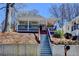 Charming bungalow with inviting front porch, and a classic, landscaped yard at 543 Paines Nw Ave, Atlanta, GA 30318