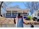Charming bungalow with inviting front porch, and a classic, landscaped yard at 543 Paines Nw Ave, Atlanta, GA 30318