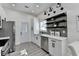 Modern kitchen with stainless steel appliances, stylish backsplash, and open shelving at 543 Paines Nw Ave, Atlanta, GA 30318