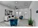 Bright living room featuring recessed lighting, modern furnishings, and large windows for ample natural light at 543 Paines Nw Ave, Atlanta, GA 30318