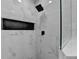 Modern shower with marble tile, black fixtures, and a niche for storage at 543 Paines Nw Ave, Atlanta, GA 30318