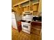 Functional kitchen featuring a white refrigerator and an electric stove at 56 Pierce Rd, Hiram, GA 30141