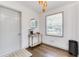 Bright entryway with hardwood floors, a console table, decorative lighting and a large window at 1300 Wichita Sw Dr, Atlanta, GA 30311