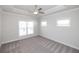 Bedroom featuring a ceiling fan, crown molding, and natural light at 167 Basil Street Dr, Cumming, GA 30040