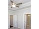 Bedroom view of bathroom and closet doorways, plus decorative ceiling at 169 Basil Street Dr, Cumming, GA 30040