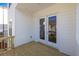 Wood deck outside with white siding, exterior door, and railing at 167 Basil Street Dr, Cumming, GA 30040