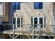 Balcony of a home, featuring patio furniture and outdoor grill at 3721 Stonewall Se Cir, Atlanta, GA 30339