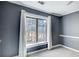 Bedroom showcasing a window with bright natural light and tree views at 3721 Stonewall Se Cir, Atlanta, GA 30339