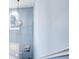 Bright foyer featuring a high ceiling, a modern light fixture, and view to a front door at 3721 Stonewall Se Cir, Atlanta, GA 30339