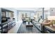 Inviting living room with stylish furnishings, hardwood floors, and glass doors offering natural light and access to the outside at 3721 Stonewall Se Cir, Atlanta, GA 30339
