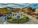 Charming village square with shops, fountain, and well-maintained landscaping under a partly cloudy sky at 3721 Stonewall Se Cir, Atlanta, GA 30339