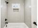 Bathroom featuring gray subway tile and bronze fixtures at 1977 Westwood Se Cir, Smyrna, GA 30080