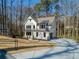 Stunning two-story modern farmhouse with a curved driveway and attached two-car garage at 1977 Westwood Se Cir, Smyrna, GA 30080