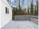 A gray wood deck looks out on the wooded backyard at 2966 Knollberry Ln, Decatur, GA 30034