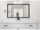Bathroom vanity with modern fixtures, white cabinets, and a large mirror at 2966 Knollberry Ln, Decatur, GA 30034