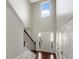 A bright and airy foyer with a tall ceiling and hardwood floors at 610 Collingsworth Ln, Dacula, GA 30043