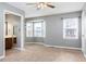 Comfortable bedroom with a bay window, neutral carpet, and gray walls at 4971 Jenny Dr, Acworth, GA 30101