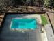 Overhead shot of a fenced in community pool surrounded by a concrete deck at 4971 Jenny Dr, Acworth, GA 30101