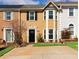 Charming townhome featuring a well-manicured front yard and inviting curb appeal at 4971 Jenny Dr, Acworth, GA 30101