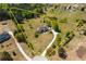 Expansive aerial view of the property, showcasing its large lot size, mature trees, and circular driveway at 815 Spring View Ct, Covington, GA 30014