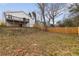 The backyard is fenced-in and has a covered deck overlooking the home's spacious backyard at 1104 Oak Knoll Se Ter, Atlanta, GA 30315