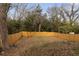 Fenced backyard offering privacy and a secure outdoor space for pets and recreation at 1104 Oak Knoll Se Ter, Atlanta, GA 30315
