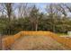 Fenced backyard offering privacy and a secure outdoor space for pets and recreation at 1104 Oak Knoll Se Ter, Atlanta, GA 30315
