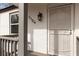 Close-up of the home's white front door, decorative security, and the house number at 1104 Oak Knoll Se Ter, Atlanta, GA 30315