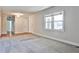 Bright living room featuring new carpet and hardwood flooring at 3549 Creatwood Se Trl, Smyrna, GA 30080