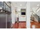 Inviting foyer with hardwood floors, staircase, and open view to living room at 1030 Whistling Swan Pl, Marietta, GA 30066