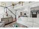 Spacious living room with a loft view, staircase, modern decor, and open layout at 1030 Whistling Swan Pl, Marietta, GA 30066