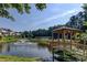 A beautiful pond with a fountain and gazebo in a well-maintained community setting at 1030 Whistling Swan Pl, Marietta, GA 30066