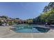 A stunning community pool with plenty of seating for residents to relax and enjoy the sun at 1030 Whistling Swan Pl, Marietta, GA 30066