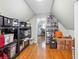 Spacious storage area with hardwood floors and lots of shelving at 1030 Whistling Swan Pl, Marietta, GA 30066