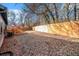 Backyard featuring a dining set and a tall wooden fence for added privacy at 2178 Penelope Nw St, Atlanta, GA 30314