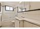 A classic white bathroom with striking black and white tile floors at 425 Lindbergh Ne Dr # A2, Atlanta, GA 30305