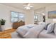 A neutral bedroom featuring a full-length mirror and light hardwood floors at 425 Lindbergh Ne Dr # A2, Atlanta, GA 30305