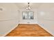 Cozy dining room featuring hardwood floors, chandelier, and natural light at 425 Lindbergh Ne Dr # A2, Atlanta, GA 30305
