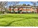 Charming brick exterior with a well-manicured lawn and green shrubbery enhancing its curb appeal at 425 Lindbergh Ne Dr # A2, Atlanta, GA 30305