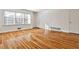 Bright living room featuring gleaming hardwood floors, large windows, and neutral paint colors at 425 Lindbergh Ne Dr # A2, Atlanta, GA 30305