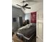 Comfortable bedroom featuring a ceiling fan and decor at 405 Sycamore Trl, Woodstock, GA 30189