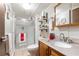 Well-lit bathroom with shower, vanity, and ample storage space at 209 Sweetwater Trl, Villa Rica, GA 30180