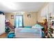 Cozy bedroom with wood floors and charming decor at 209 Sweetwater Trl, Villa Rica, GA 30180
