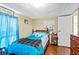 Bright bedroom with wood floors featuring a playful décor and natural light at 209 Sweetwater Trl, Villa Rica, GA 30180