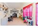 Versatile bonus room offering flexible space for a home office or playroom at 209 Sweetwater Trl, Villa Rica, GA 30180