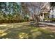 Expansive backyard features lush lawn, mature trees, and stone landscaping at 4095 Oberon Se Ct, Smyrna, GA 30080
