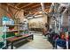 Unfinished basement with exposed ductwork, tools, storage shelves, and various items at 4095 Oberon Se Ct, Smyrna, GA 30080