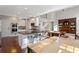 Open-concept kitchen with stainless steel appliances, granite counters, breakfast bar and eat in dining area at 4095 Oberon Se Ct, Smyrna, GA 30080