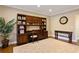 Spacious office features wood floors, a built-in bookcase, and ample workspace at 4095 Oberon Se Ct, Smyrna, GA 30080